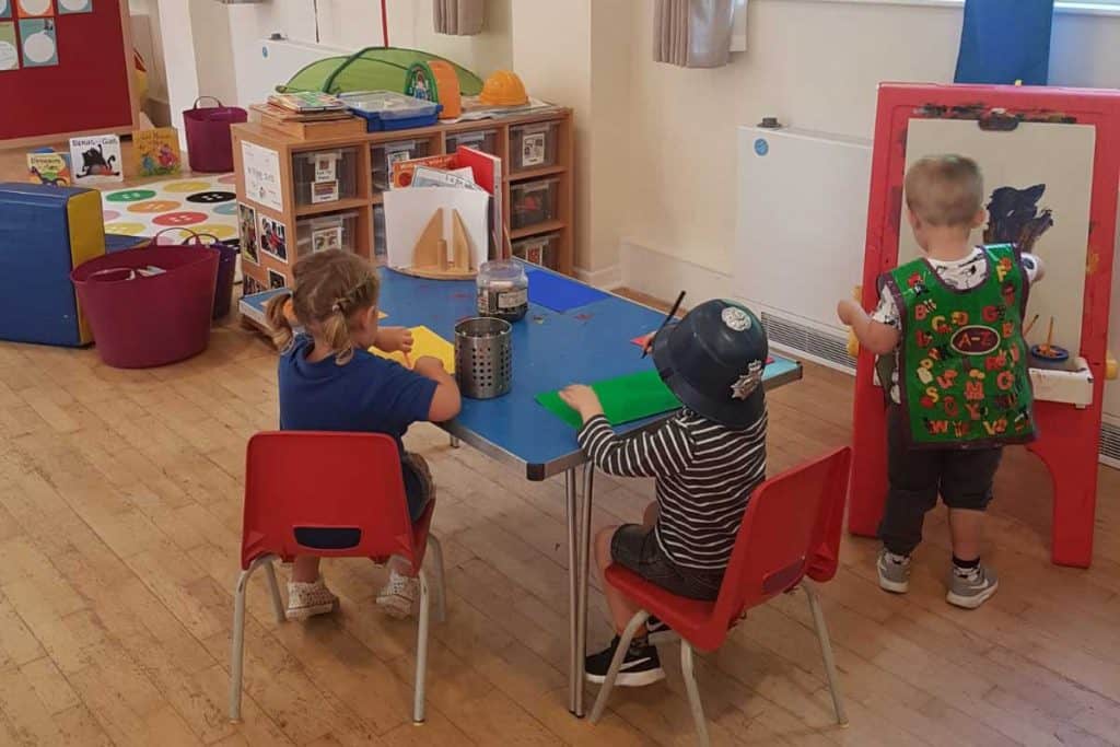 Children engaging in creative activities at Whitley Community Preschool.