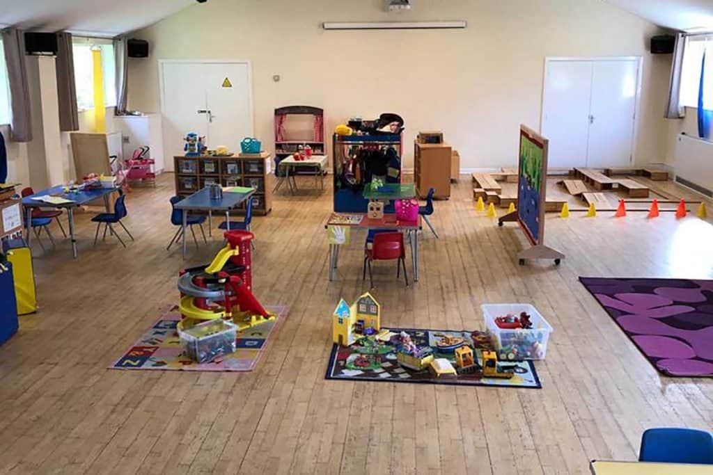 Bright and engaging preschool play area with toys and activity zones.